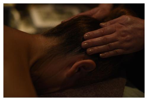 a woman with her hand on her hair at Queens Hotel & Spa in Brighton & Hove
