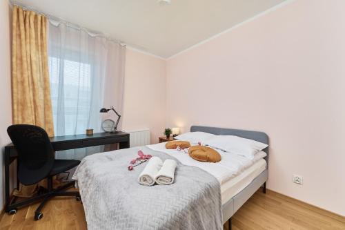 Posteľ alebo postele v izbe v ubytovaní Wrocław Rose Apartments by Noclegi Renters
