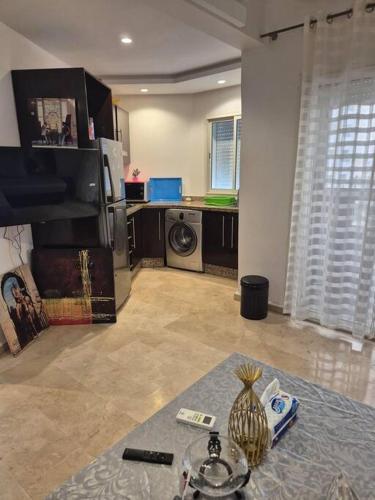 Kuchyň nebo kuchyňský kout v ubytování Charmant Studio - Vue sur mer