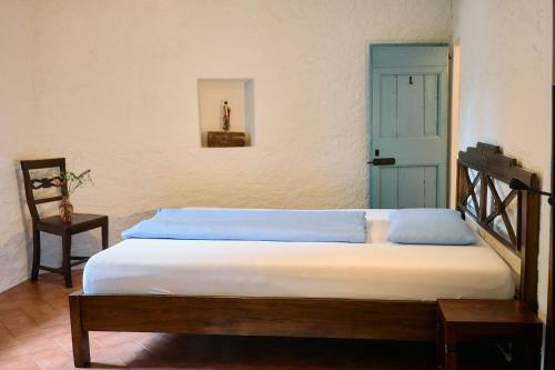 Postel nebo postele na pokoji v ubytování Albergo Casa Santo Stefano