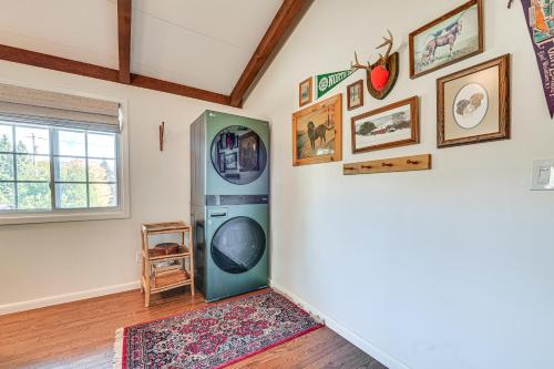 a room with a washing machine in the corner of a room at Cozy Mtn-View Chalet Less Than 2 Mi to Windham Slopes in Windham