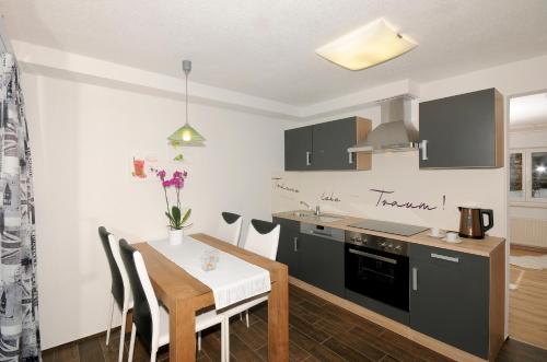 Kuchyň nebo kuchyňský kout v ubytování Appartement Mia