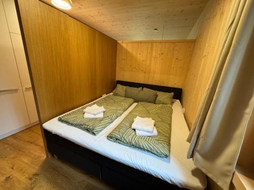 Una cama o camas en una habitación de Apartment Kanisfluh