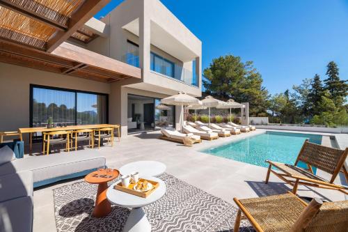an image of a house with a swimming pool at Mirena Luxury Living-Mirena Villa in Afantou