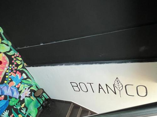 a sign with the words botamco on it at Art House in Luanda
