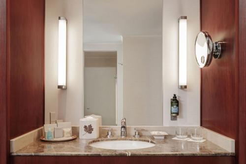 a bathroom with a sink and a mirror at JW Marriott Quito in Quito