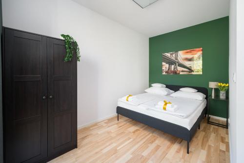 Katil atau katil-katil dalam bilik di GO Apartments - ApartHotel