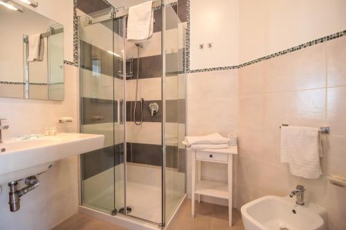 Bagno di Hotel Il Faro Della Guitgia Tommasino