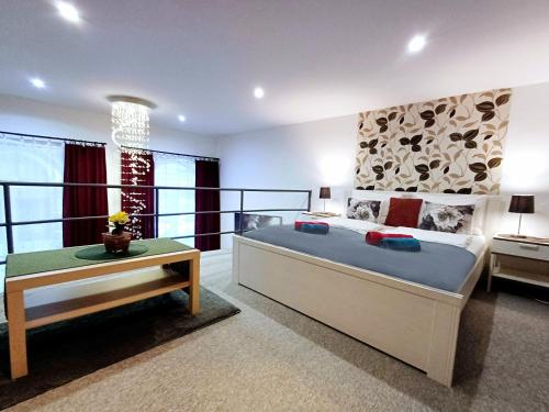 Posteľ alebo postele v izbe v ubytovaní Downtown Acacia str Apartment