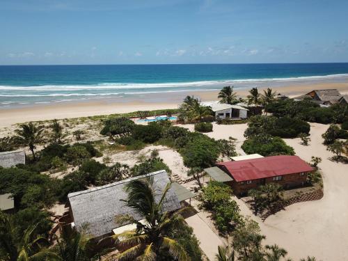 an aerial view of a beach with houses and the ocean at Bay View Lodge in Miramar