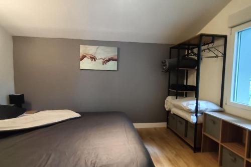 Postel nebo postele na pokoji v ubytování Maisonnette au pied des Pyrénées