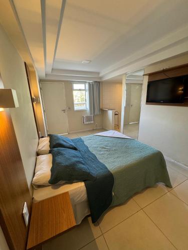 Katil atau katil-katil dalam bilik di Hotel Cantareira