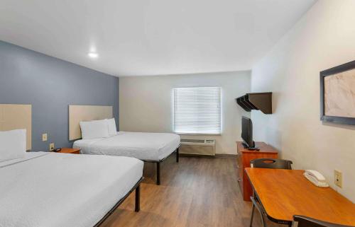 Postel nebo postele na pokoji v ubytování Extended Stay America Select Suites - Austin - Round Rock
