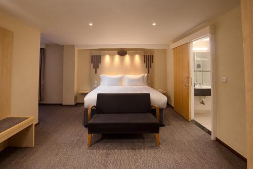 Letto o letti in una camera di Tavistock Hotel