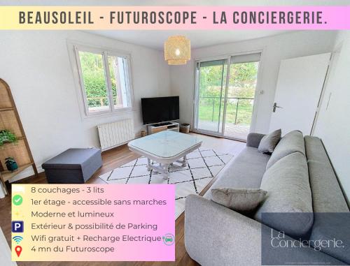 a living room with a couch and a table at Beausoleil - Futuroscope - LaConciergerie in Chasseneuil-du-Poitou