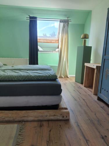 Katil atau katil-katil dalam bilik di Ferienwohnung Biessenhofen