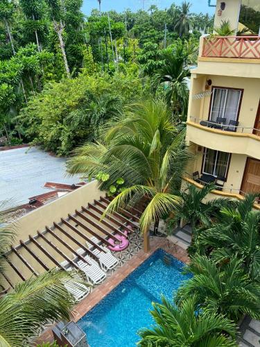 an aerial view of a resort with a swimming pool at Sorenzo Maldives in Thoddoo