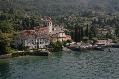 an aerial view of a town next to a body of water at Apartment with garden and parking in Bellagio