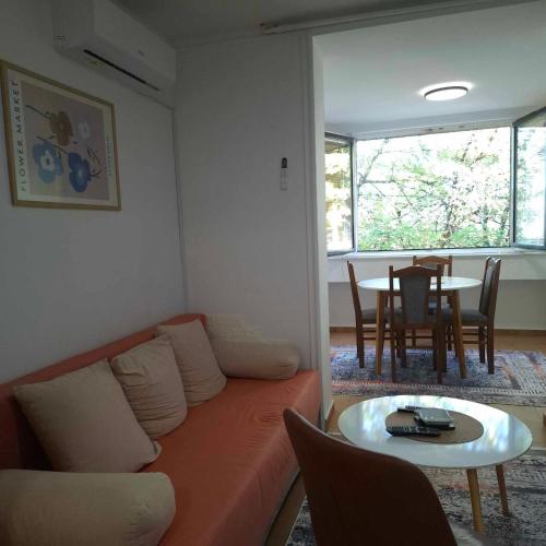 a living room with a couch and a table at Villa Sabic in Sarajevo