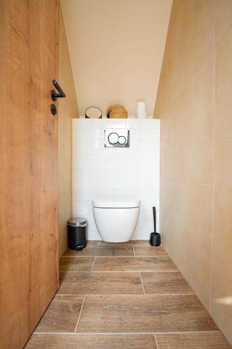 Un baño de Apartmány V zahradě