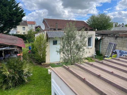 Petite maison cosy au fond du jardin