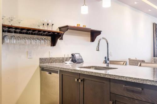 a kitchen with a sink and a counter top at 3 Bedroom Condo in Croc's Casino Resort in Jacó