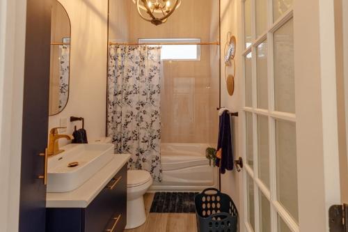 a bathroom with a sink and a toilet and a shower at Mountain Escape with Pool, Near Ski Slopes & Trails in Wentworth-Nord
