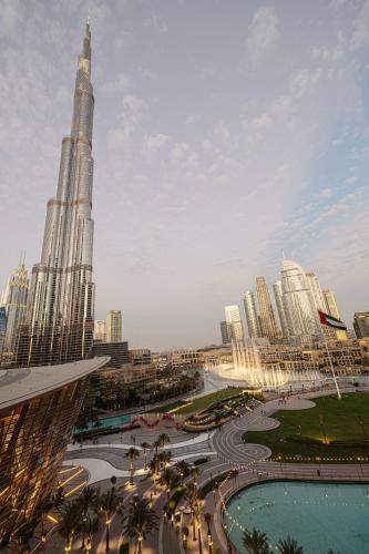 a view of the burj khalifa and a city at Best View In Dubai With FULL Burj Khalifa, Fountains, Park View, Next to Dubai Mall and Opera in Dubai