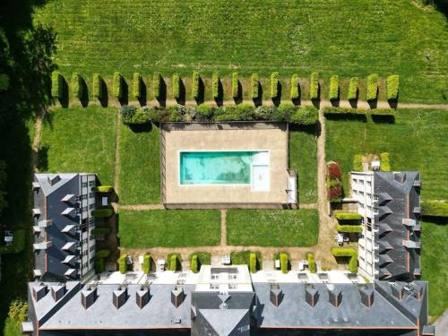 Kolam renang di atau dekat dengan Château de Kergonano appartement L'écrin du Golfe