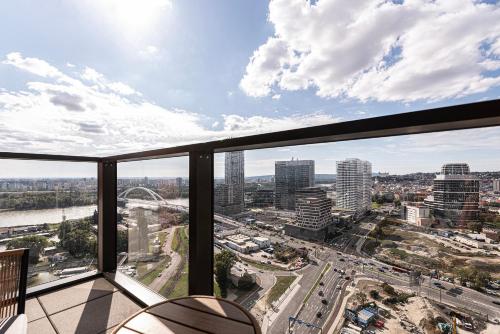 a view of a city from a building at Klingerka Apartment, 25th floor with Free parking and view of Castle and Danube in Bratislava