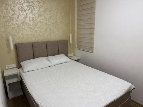 Ένα ή περισσότερα κρεβάτια σε δωμάτιο στο Apartman Dragić