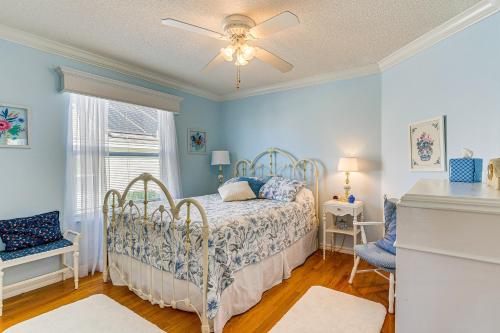 a bedroom with a bed and a ceiling fan at Walk to Golf and Pool Pet-Friendly Villages Home in The Villages