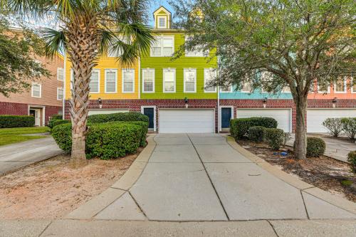 a sidewalk in front of a building with trees and bushes at Townhome 3 Mi to Wescott Park and Golf Course! in Ladson