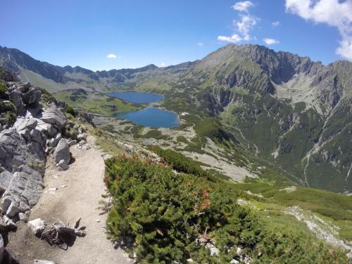 a view from the top of a mountain with a lake at Łukaszówki przy Krupówkach in Zakopane