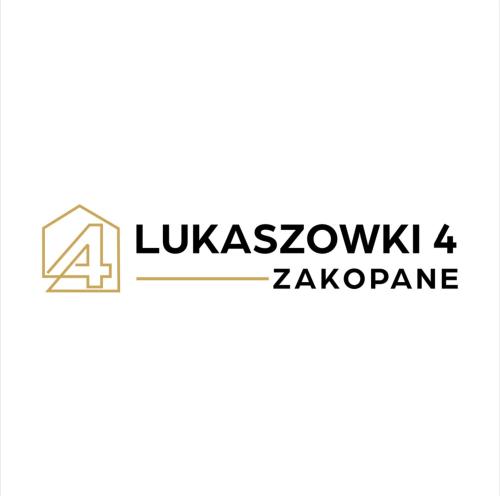 a logo for a company with four numbers on it at Łukaszówki przy Krupówkach in Zakopane