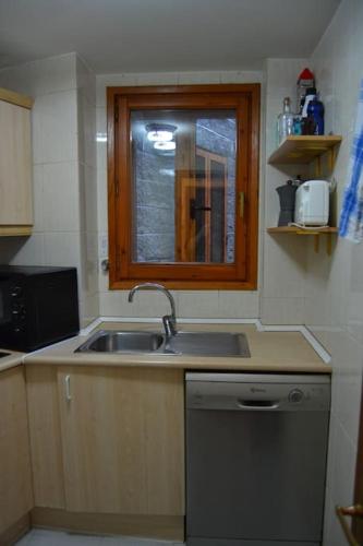 Η κουζίνα ή μικρή κουζίνα στο Arafita, cálido y familiar - Arafita Apartamentos