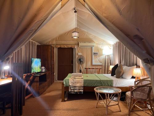 Posezení v ubytování AT ONE - with Nature Glamping Resort