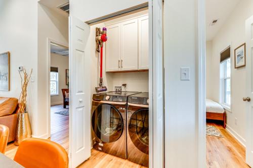a laundry room with a washer and dryer at Waterfront Lake Hickory Retreat with Private Dock! in Hickory