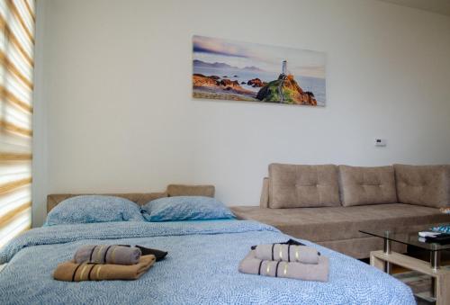 Postel nebo postele na pokoji v ubytování Comfort apartment Bulevar with garage