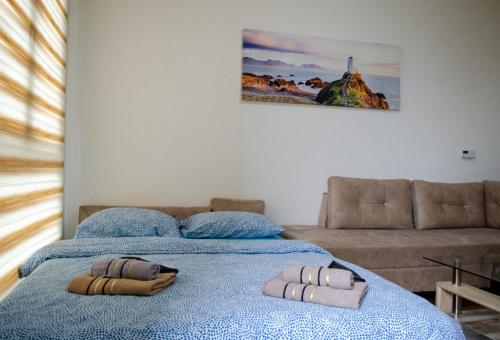 Postel nebo postele na pokoji v ubytování Comfort apartment Bulevar with garage