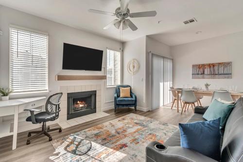 a living room with a couch and a fireplace at Mountain View by Cloud Dream Homes in Clearfield