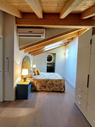 a bedroom with a bed in a room at Casa Larius in Como
