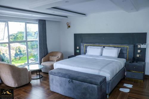 Krevet ili kreveti u jedinici u okviru objekta Highlands View Boutique Villas & Resort, Nyeri