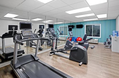 a gym with several treadmills and cardio machines at Holiday Inn Express & Suites Kings Mountain - Shelby Area by IHG in Kings Mountain