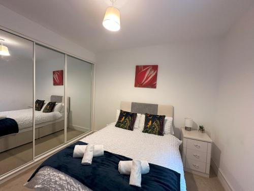 Ένα ή περισσότερα κρεβάτια σε δωμάτιο στο Sea View Apartment - 2 Bedrooms - Sleeps 4