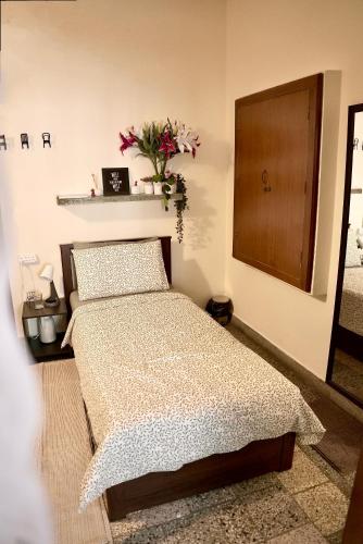Ένα ή περισσότερα κρεβάτια σε δωμάτιο στο Backpackers Den Chandigarh
