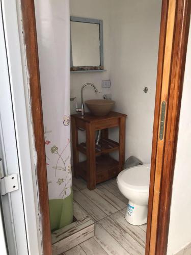 a bathroom with a sink and a toilet at 2 Duplex camet norte santa clara del mar in Camet Norte