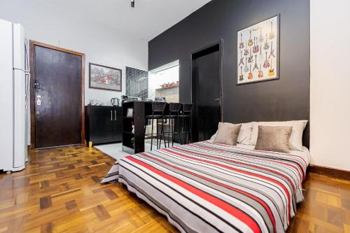 Кровать или кровати в номере Edifício Kwasisnki | Praça Osório | Curitiba | Gonzaga Stays