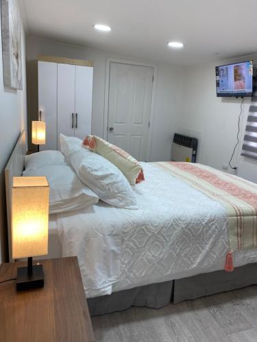 Ένα ή περισσότερα κρεβάτια σε δωμάτιο στο Hostal Like Home