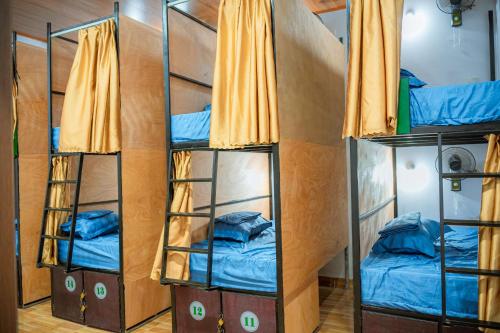 Katil atau katil-katil dalam bilik di Tam Coc Sunshine Hostel
